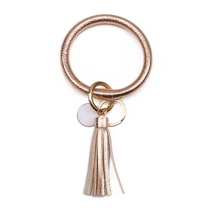 Rose gold PU leather tassel keychain ring with large circular bracelet and metal tag