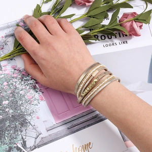 Multilayer bohemian seed bead bracelet with golden chains and leather strap for women