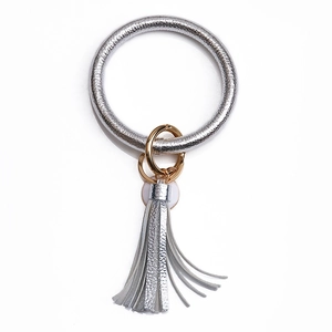 Silver textured PU leather oversized ring keychain with golden clasp and tassel charm