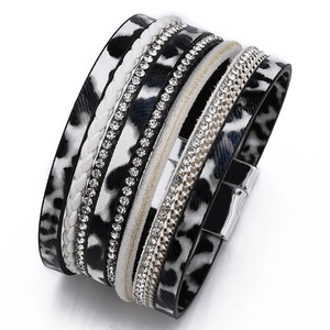 Close-up of leopard print PU leather and rhinestone wrap bracelet with magnetic buckle