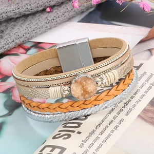 Detail of bohemian multilayer leather bracelet with druzy stone and magnetic clasp