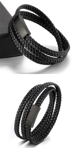 Detail view of multi-layer braided black leather bracelet with matte magnetic steel clasp
