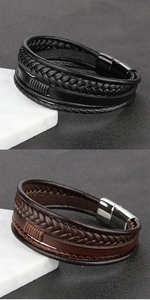 Détail de bracelets multicouches en cuir tressé noir et marron avec fermoir magnétique