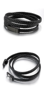 Detail showing the magnetic metal clasp and multi-layer braided black leather texture