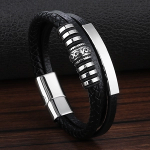 Men's braided black leather bracelet with polished silver stainless steel metal accents