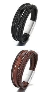 Détail de bracelets en cuir tressé noir et marron avec fermoirs magnétiques en métal brossé