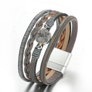 Detail view of Bohemian multilayer leather bracelet with a grey druzy stone and magnetic clasp