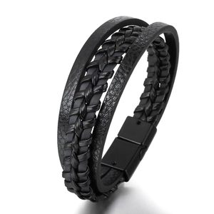 Men's multi-layer black braided leather bracelet with magnetic clasp on white background
