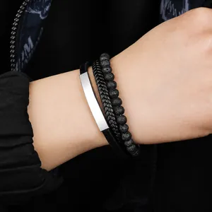 Three-piece men's bracelet set with black leather, braided rope and natural lava stone beads