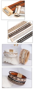 Détail d'un bracelet multicouche en cuir avec breloque éléphant et fermoir magnétique