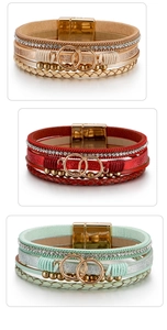 Detail of bohemian multilayer leather bracelets with magnetic clasp and rhinestones