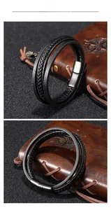 Detail of multi-layer black braided leather men's bracelet with matte magnetic clasp