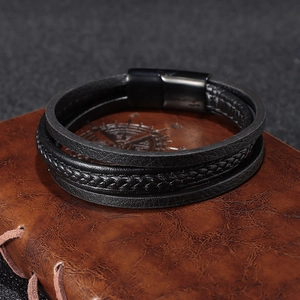 Men's multilayer black braided leather bracelet with a sleek black magnetic clasp