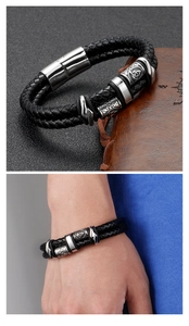Detail of double-layer braided leather bracelet with Celtic knot metal beads and magnetic clasp