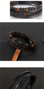 Dettaglio di un bracciale multistrato da uomo con pietre occhio di tigre e cuoio nero