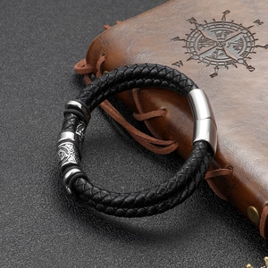 Men's braided black leather bracelet with patterned stainless steel beads and magnetic clasp