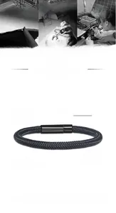 Detail view of black woven steel wire bracelet with magnetic clasp and 21cm length size
