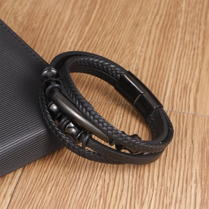 Multilayer men's leather bracelet with woven cords, bamboo beads, and magnetic clasp