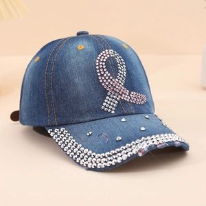 Denim baseball cap with pink ribbon rhinestone design and sparkling brim detail
