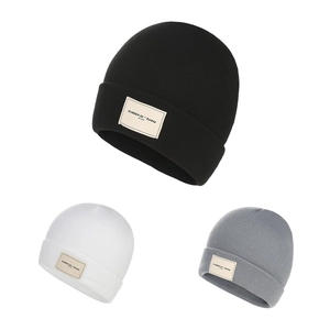 Unisex ribbed knit beanie set in black, white, and gray with stylish industrial labels