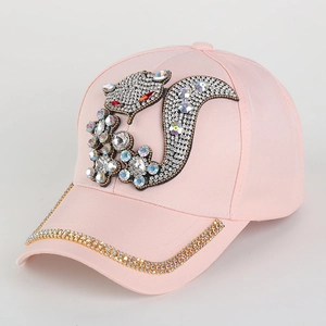 Pink velvet baseball cap with sparkling rhinestone squirrel pattern and studded brim