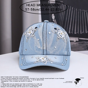 Detail of light blue denim baseball cap with rhinestone stars and head size measurement