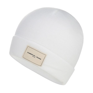 White knit beanie for adults with a rectangular logo patch and rolled cuff design