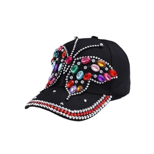 Fashion baseball cap featuring a large colorful rhinestone butterfly on black cotton canvas