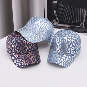Fashionable leopard print baseball caps with metallic finish in navy and light blue colors