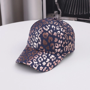 Fashionable navy blue baseball cap featuring rose gold leopard print and metal foil finish