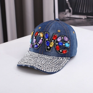 Denim baseball cap with colorful LOVE gemstone lettering and rhinestone-studded brim