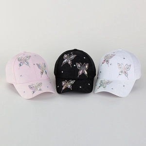 Women's baseball caps with colorful rhinestone butterflies in pink, black and white colors