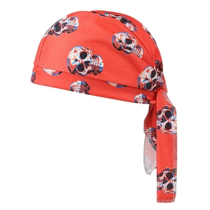 Detail of red pirate headscarf showing breathable mesh fabric and skull print