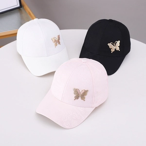 Modische Baseballkappen in Weiß Schwarz und Rosa mit glitzernden Schmetterlingsmotiven
