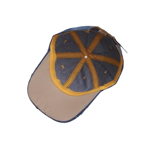 Blaue Jeans-Baseballkappe mit gelbem Innenfutter und verstärkter Sechs-Panel-Struktur