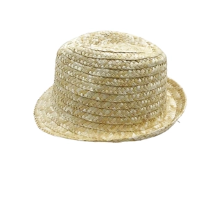 Close-up of tight weave texture on natural straw sun hat with flat top and short brim