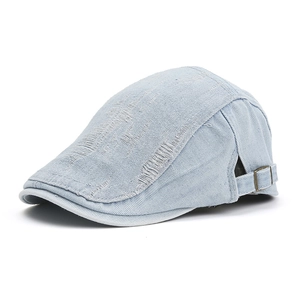 Distressed light blue denim flat cap with vintage metal buckle and frayed texture