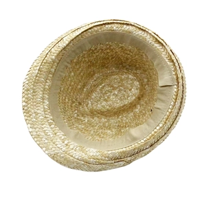 Detail of the high-quality woven texture and inner sweatband of this straw sun hat