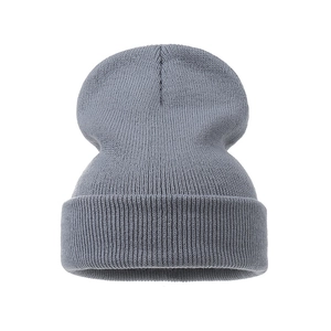 Detailed view of high-elasticity grey ribbed knit beanie with stylish folded cuff design