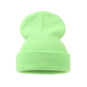 Detail of the fine ribbed knit texture on this warm neon green winter beanie hat