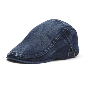 Navy blue denim flat cap with vintage washed texture and adjustable metal side buckle