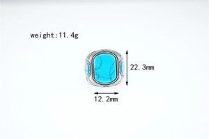 Detailed macro view showing the 11.4g weight and turquoise stone ring measurements