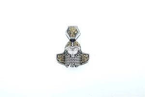Detail of Viking Mjölnir pendant with Celtic knot patterns and antique silver finish