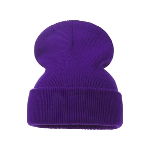 Detail view of purple ribbed knit beanie with stylish folded cuff for winter warmth