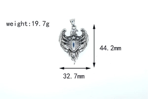 Close-up of hip hop eagle shield pendant with blue inlay and detailed dimensions