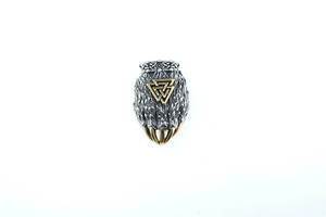 Detailed close-up of viking bear paw pendant with golden valknut symbol and silver texture