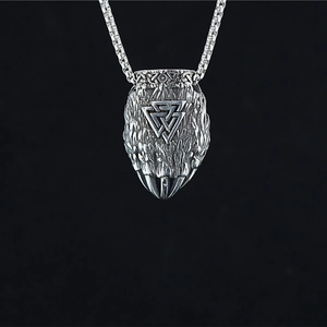 Vintage oxidized stainless steel bear paw necklace with Valknut symbol on black background