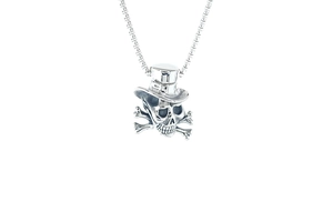 Détail du pendentif crâne vintage avec haut-de-forme et os croisés sur chaîne à billes