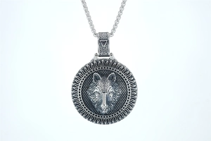 Close-up of retro wolf head relief pendant on vintage titanium steel necklace