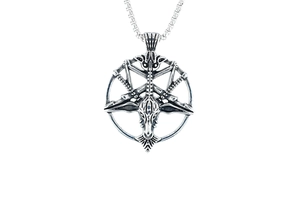 Macro shot of silver Baphomet goat head pendant with inverted pentagram on necklace